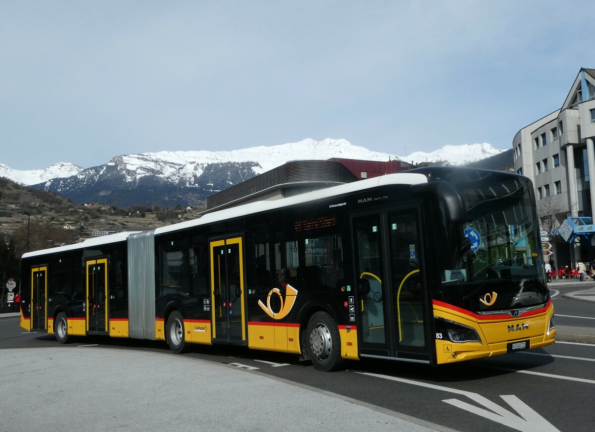 (247'231) - PostAuto Wallis - Nr. 83/VS 548'723/PID 11'886 - MAN am 16. M�rz 2023 beim Bahnhof Sion