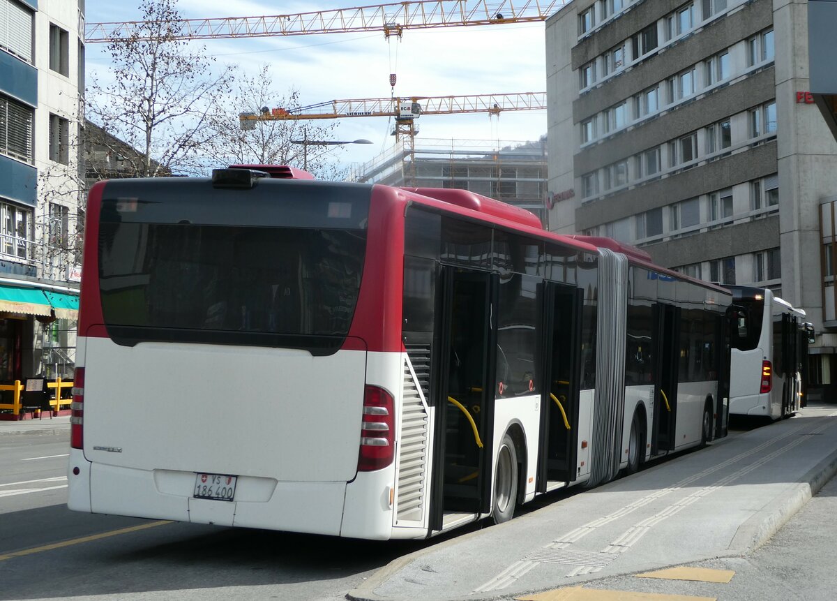 (247'237) - PostAuto Wallis - Nr. 65/VS 186'400/PID 5315 - Mercedes (ex Lathion, Sion Nr. 65) am 16. M�rz 2023 beim Bahnhof Sion