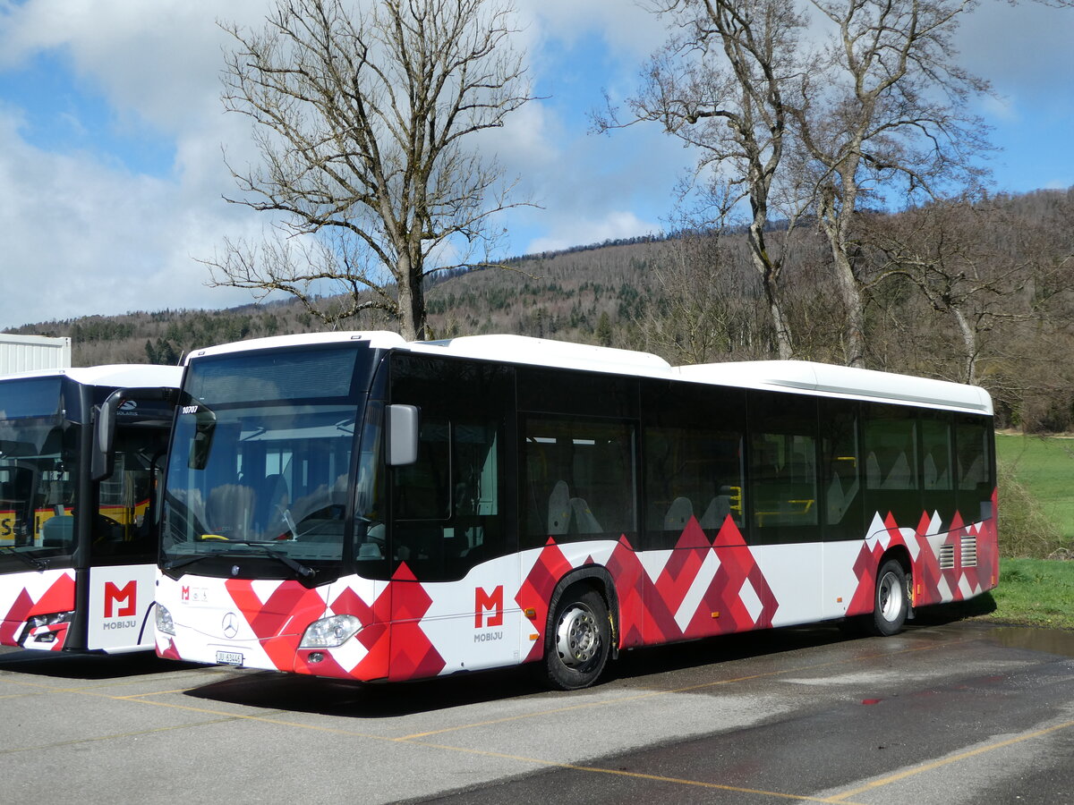 (247'616) - CarPostal Ouest - JU 63'446/PID 10'707 - Mercedes (ex VD 613'446) am 25. M�rz 2023 in Develier, Parkplatz