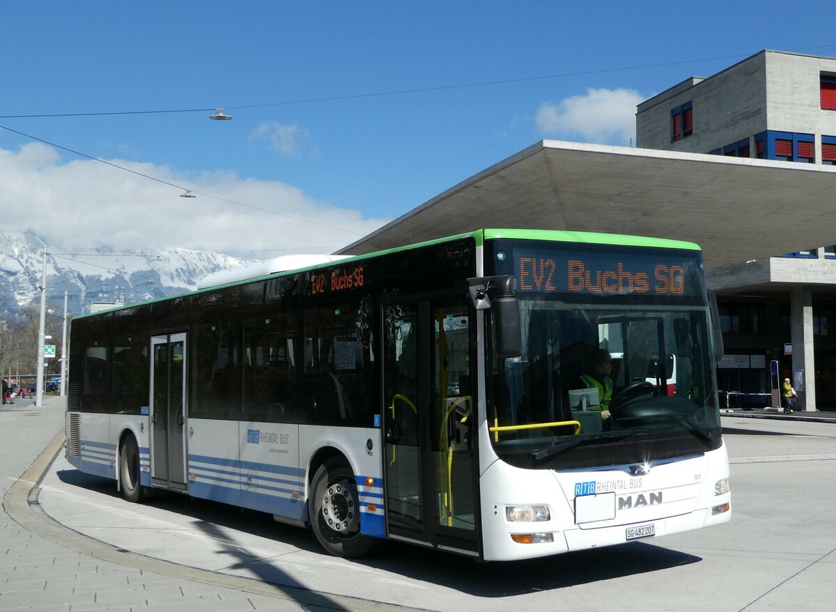 (247'778) - RTB Altst�tten - Nr. 911/SG 482'207 - MAN (ex PostBus/A BD 15'342) am 28. M�rz 2023 beim Bahnhof Buchs