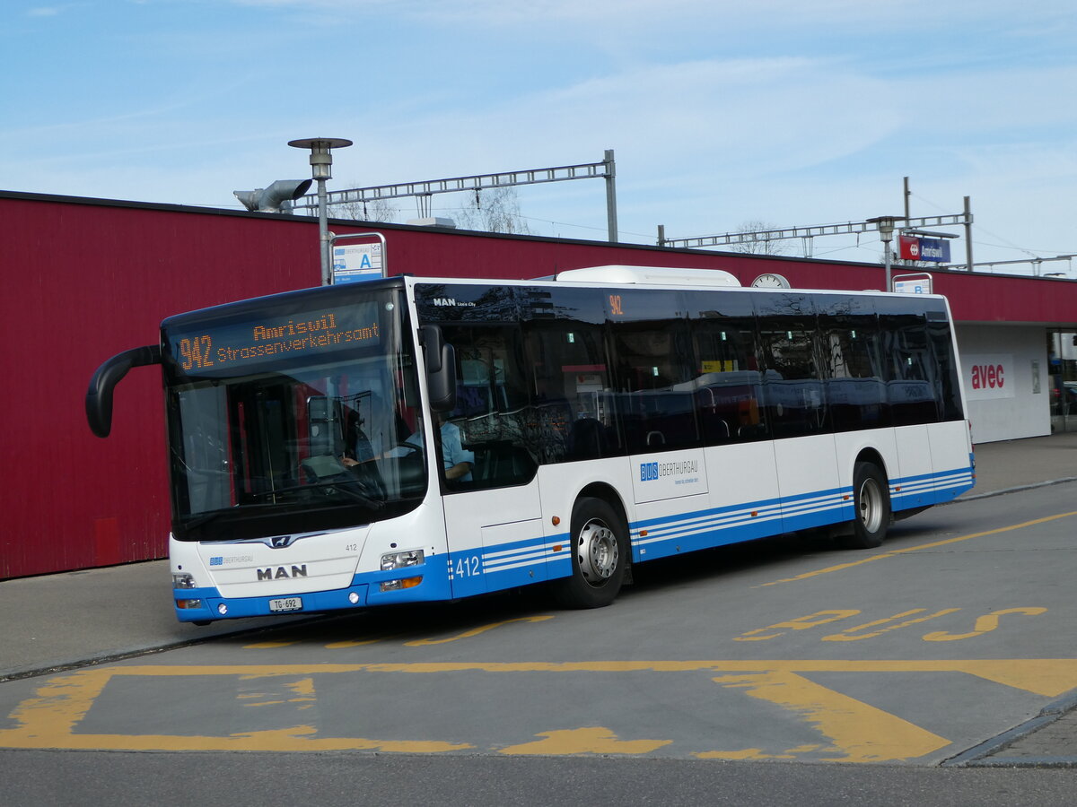 (247'819) - BOTG Amriswil - Nr. 412/TG 692 - MAN am 28. M�rz 2023 beim Bahnhof Amriswil