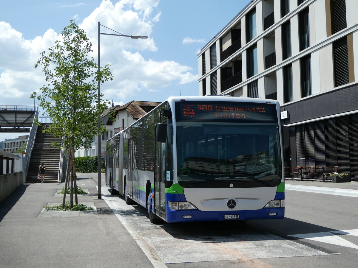 (252'440) - Intertours, Domdidier - Nr. 555/FR 300'555 - Mercedes (ex Nr. 412; ex TPL Lugano Nr. 412) am 7. Juli 2023 beim Bahnhof Del�mont