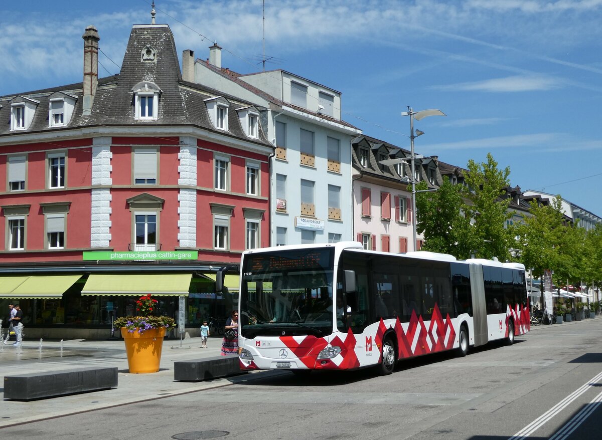 (252'441) - CarPostal Ouest - JU 36'039/PID 11'739 - Mercedes am 7. Juli 2023 beim Bahnhof Del�mont