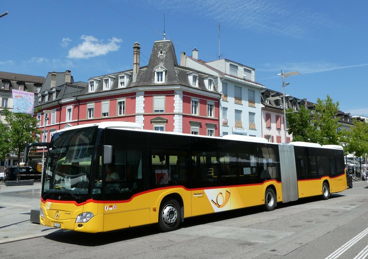 (252'448) - PostAuto Nordschweiz - BL 128'484/PID 11'496 - Mercedes am 7. Juli 2023 beim Bahnhof Del�mont