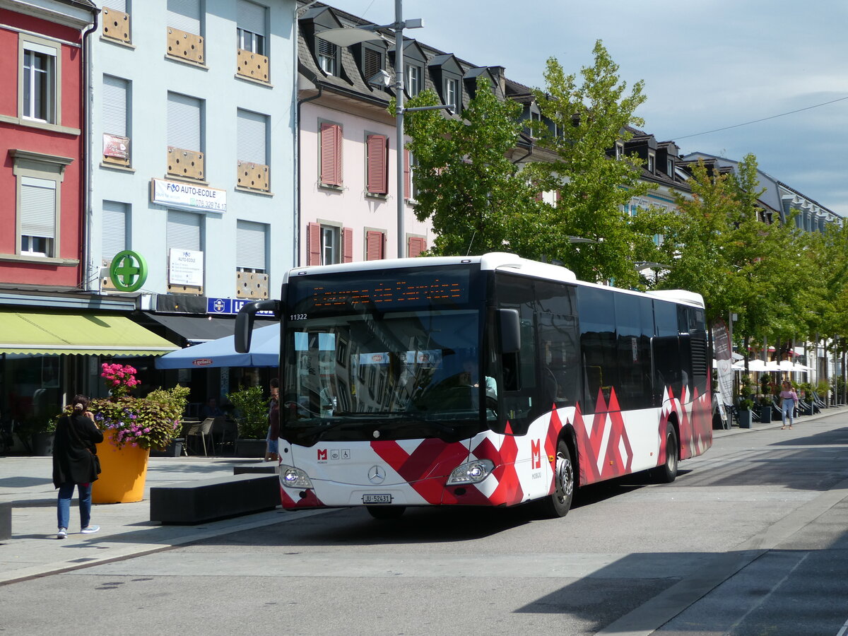 (253'687) - CarPostal Ouest - JU 52'431/PID 11'322 - Mercedes am 12. August 2023 beim Bahnhof Del�mont
