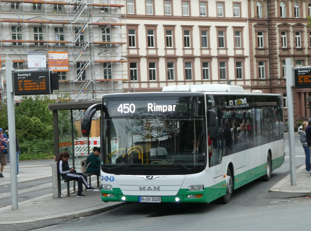 (254'325) - OVF N�rnberg - N-OV 2028 - MAN am 29. August 2023 beim Bahnhof W�rzburg