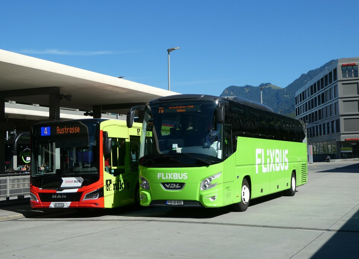 (255'592) - Aus Deutschland: Gr�ner, Rudelzhausen - FS-G 486 - VDL am 26. September 2023 beim Bahnhof Chur