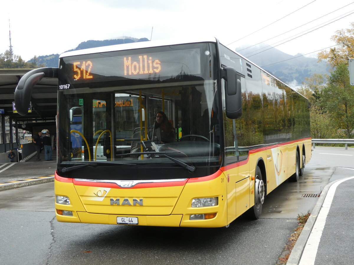 (256'565) - Niederer, Filzbach - Nr. 31/GL 44/PID 10'167 - MAN (ex Schwizer, Goldach; ex Casutt, Gossau) am 31. Oktober 2023 beim Bahnhof Ziegelbr�cke