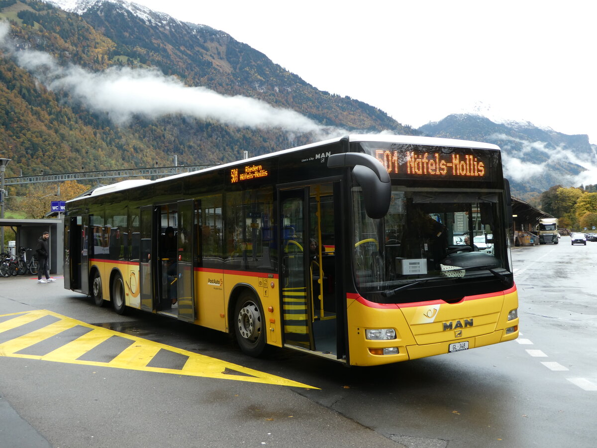 (256'591) - Niederer, Filzbach - GL 348/PID 5663 - MAN (ex D�nser, Trimmis) am 31. Oktober 2023 beim Bahnhof Glarus