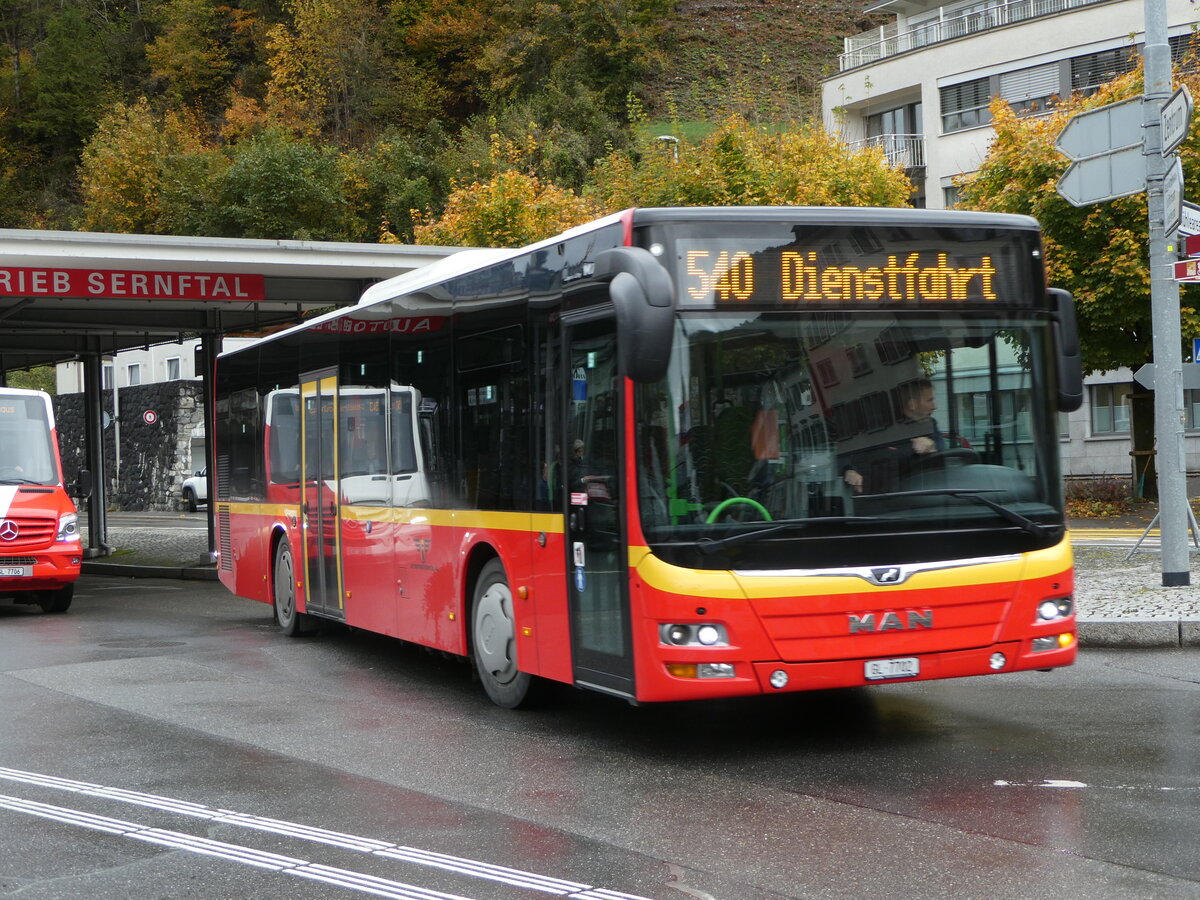 (256'607) - AS Engi - Nr. 2/GL 7702 - MAN (ex Gessert, D-Finsterbergen; ex Herrmann, D-Sch�nau vor dem Walde) am 31. Oktober 2023 beim Bahnhof Schwanden