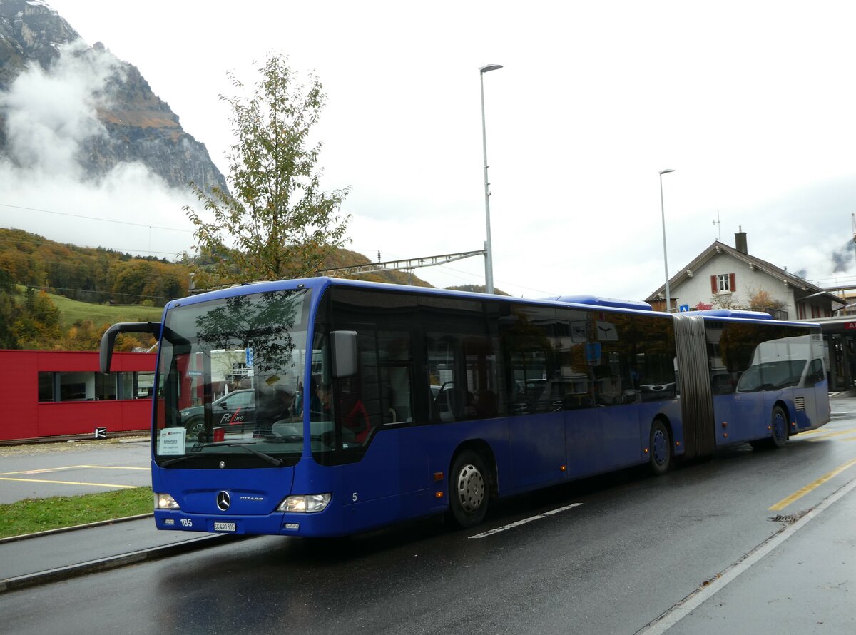 (256'608) - Domo, Glattbrugg - Nr. 5/SG 490'805 - Mercedes (ex VBZ Z�rich Nr. 185; ex VZO Gr�ningen Nr. 102) am 31. Oktober 2023 beim Bahnhof Schwanden