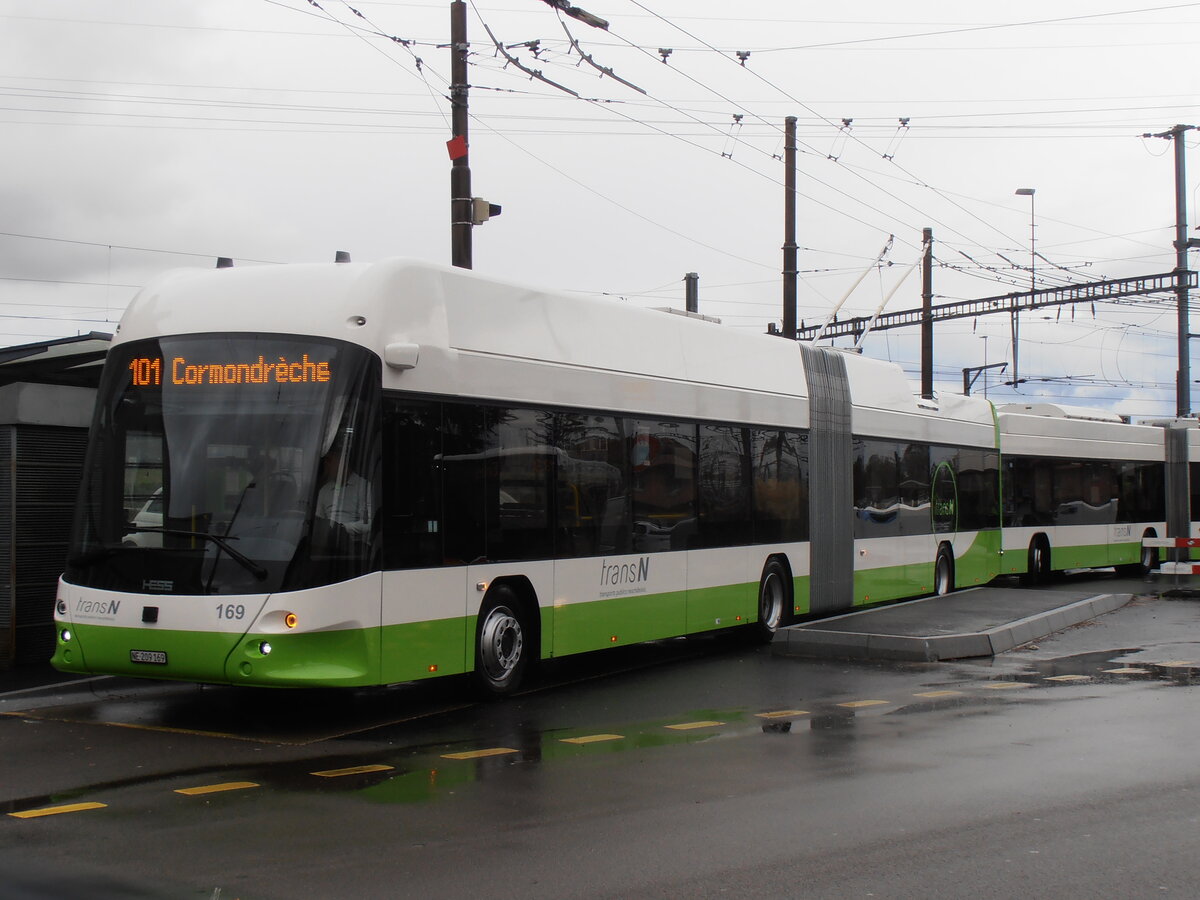 (257'540) - transN, La Chaux-de-Fonds - Nr. 169/NE 209'169 - Hess/Hess Gelenktrolleybus am 11. Dezember 2023 beim Bahnhof Marin-�pagnier