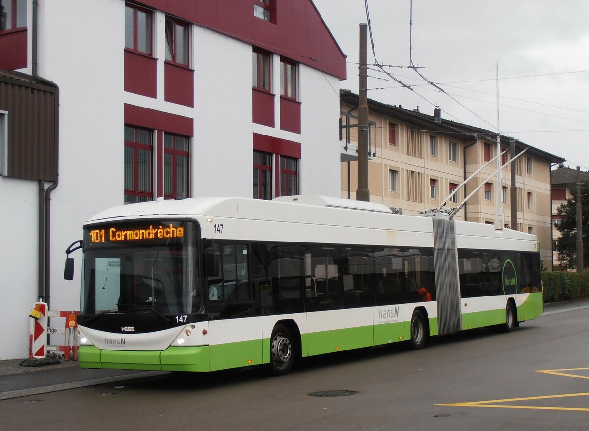 (257'573) - transN, La Chaux-de-Fonds - Nr. 147 - Hess/Hess Gelenktrolleybus (ex TN Neuch�tel Nr. 147) am 11. Dezember 2023 beim Bahnhof Marin-�pagnier