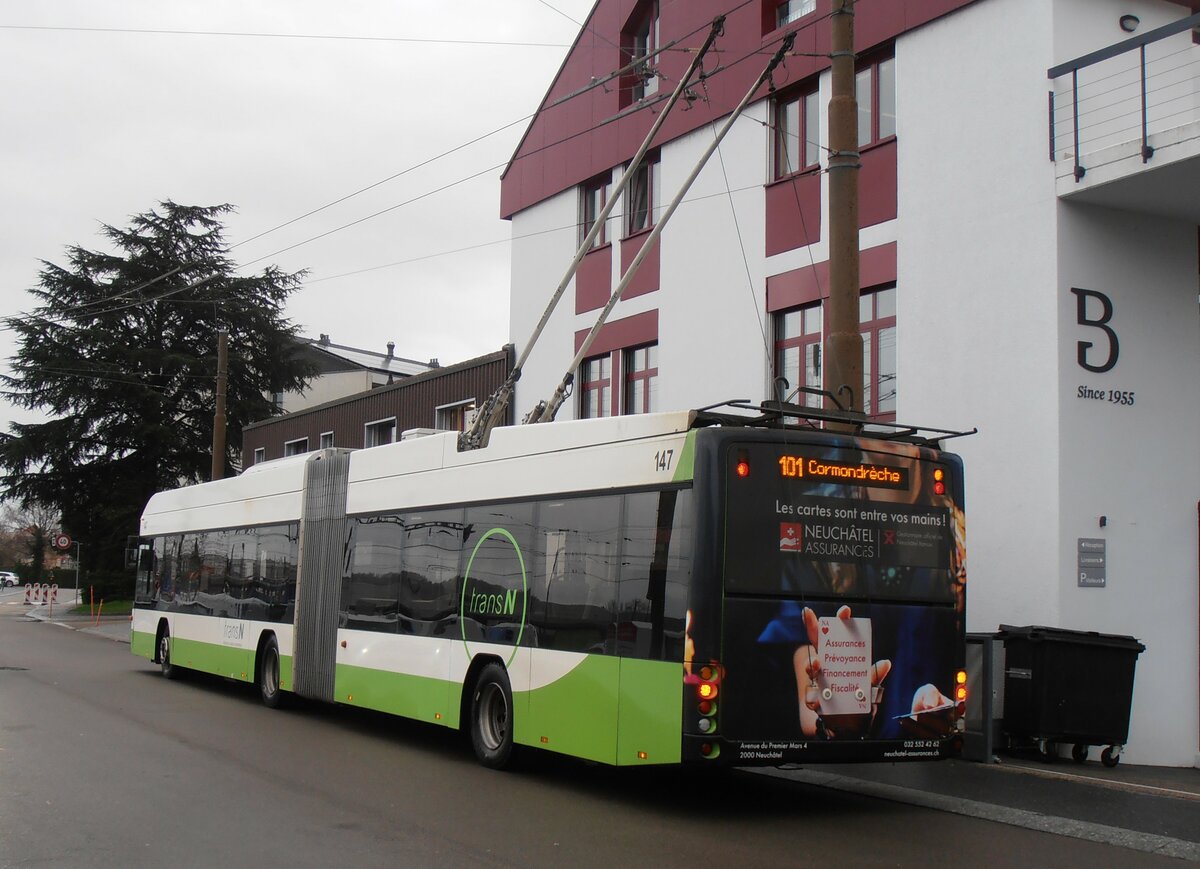 (257'574) - transN, La Chaux-de-Fonds - Nr. 147 - Hess/Hess Gelenktrolleybus (ex TN Neuch�tel Nr. 147) am 11. Dezember 2023 beim Bahnhof Marin-�pagnier