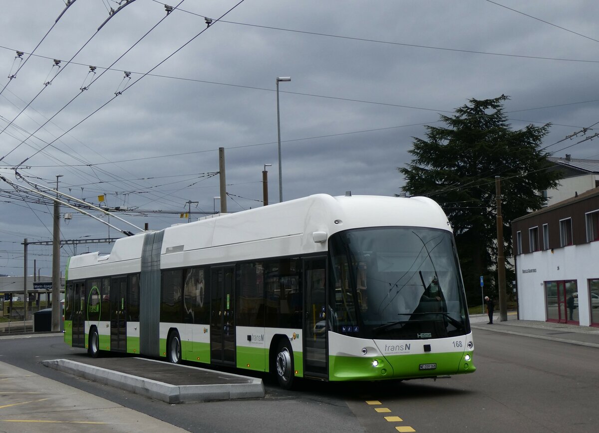 (258'965) - transN, La Chaux-de-Fonds - Nr. 168/NE 209'168 - Hess/Hess Gelenktrolleybus am 26. Januar 2024 beim Bahnhof Marin-�pagnier