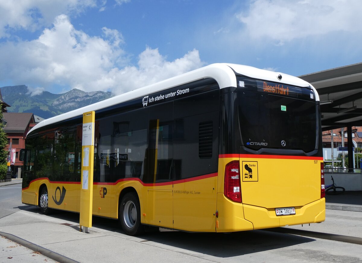 (265'336) - PostAuto Zentralschweiz (H�fliger) - Nr. 537/OW 16'637/PID 12'021 - eMercedes am 2. August 2024 beim Bahnhof Sarnen