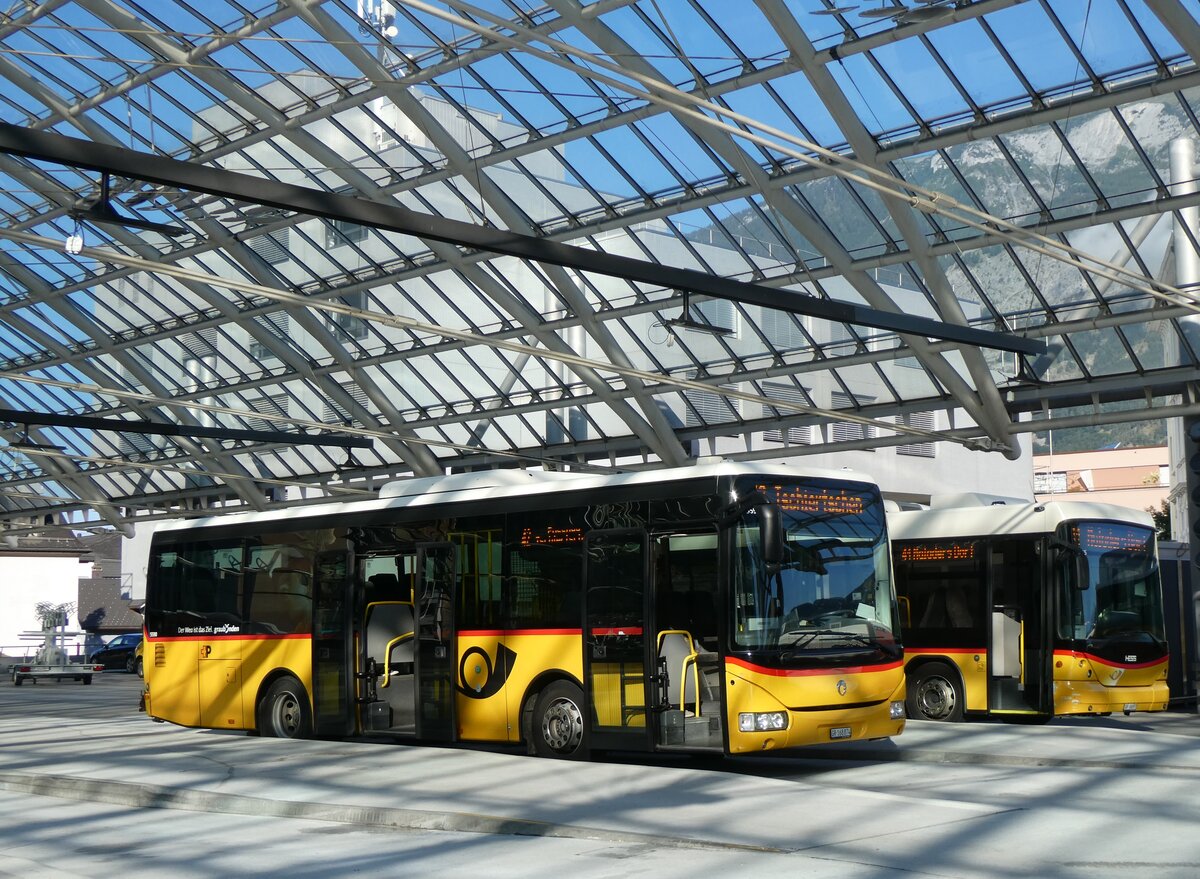 (266'208) - PostAuto Graub�nden - GR 168'874/PID 5590 - Irisbus am 27. August 2024 in Chur, Postautostation