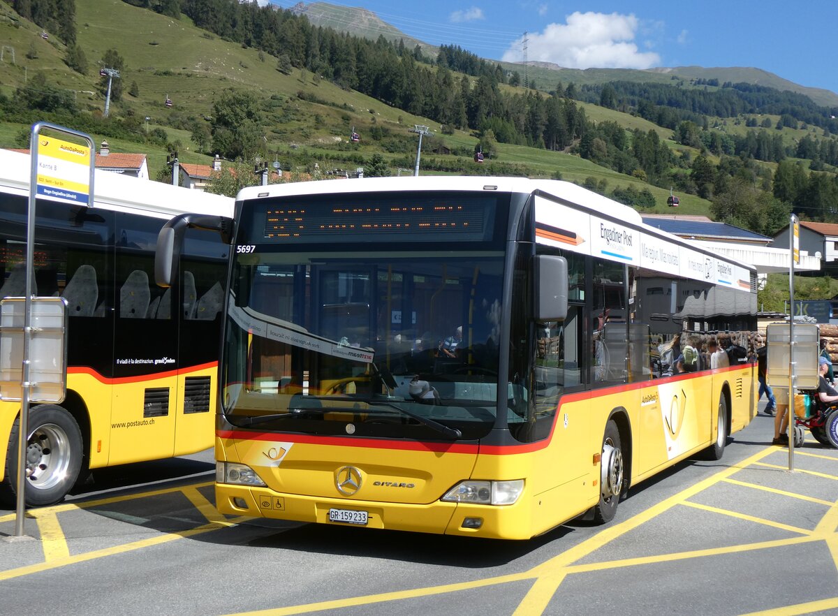 (266'217) - PostAuto Graub�nden - GR 159'233/PID 5697 - Mercedes am 27. August 2024 beim Bahnhof Scuol-Tarasp