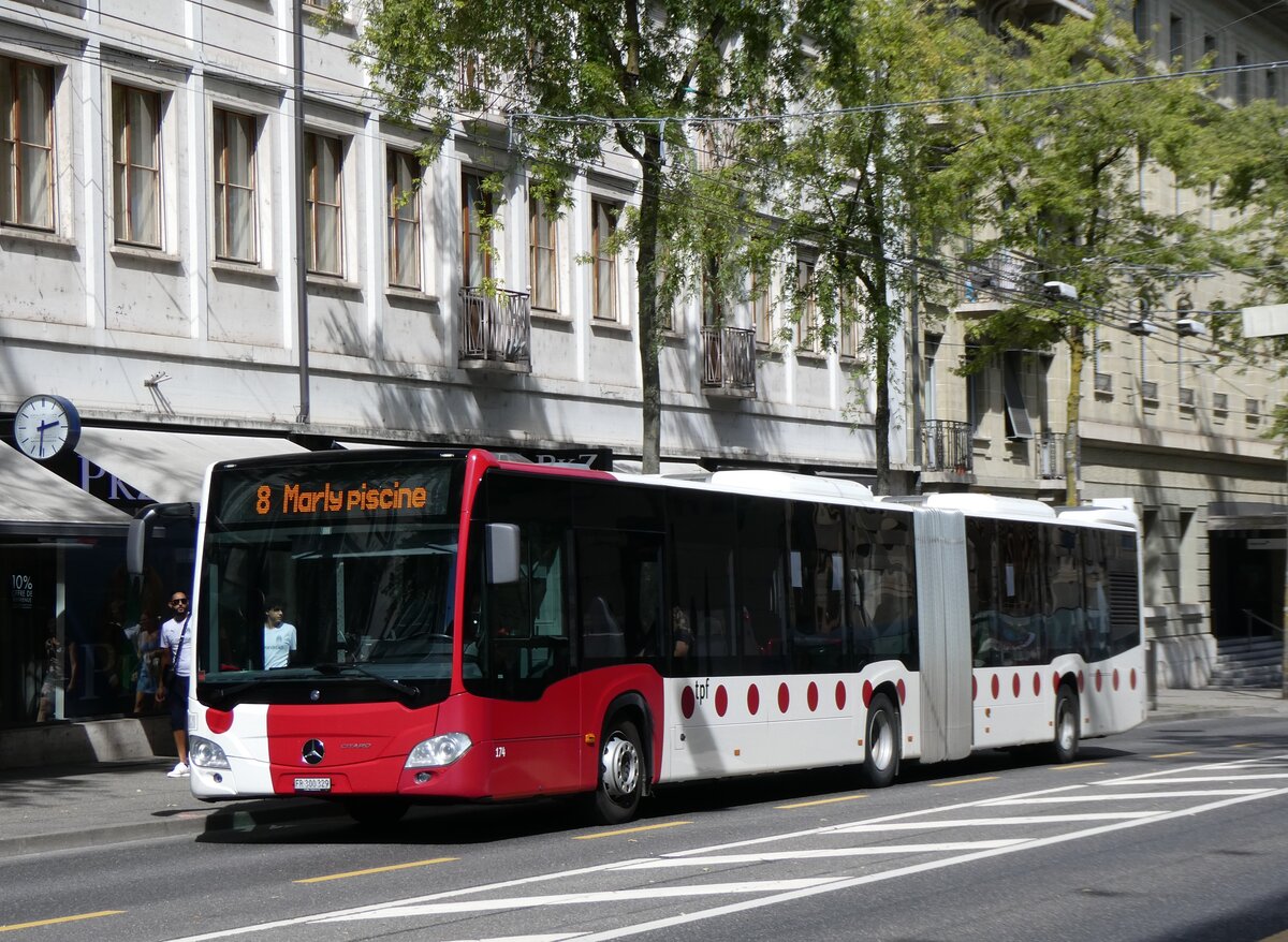 (266'826) - TPF Fribourg - Nr. 174/FR 300'329 - Mercedes am 7. September 2024 beim Bahnhof Fribourg