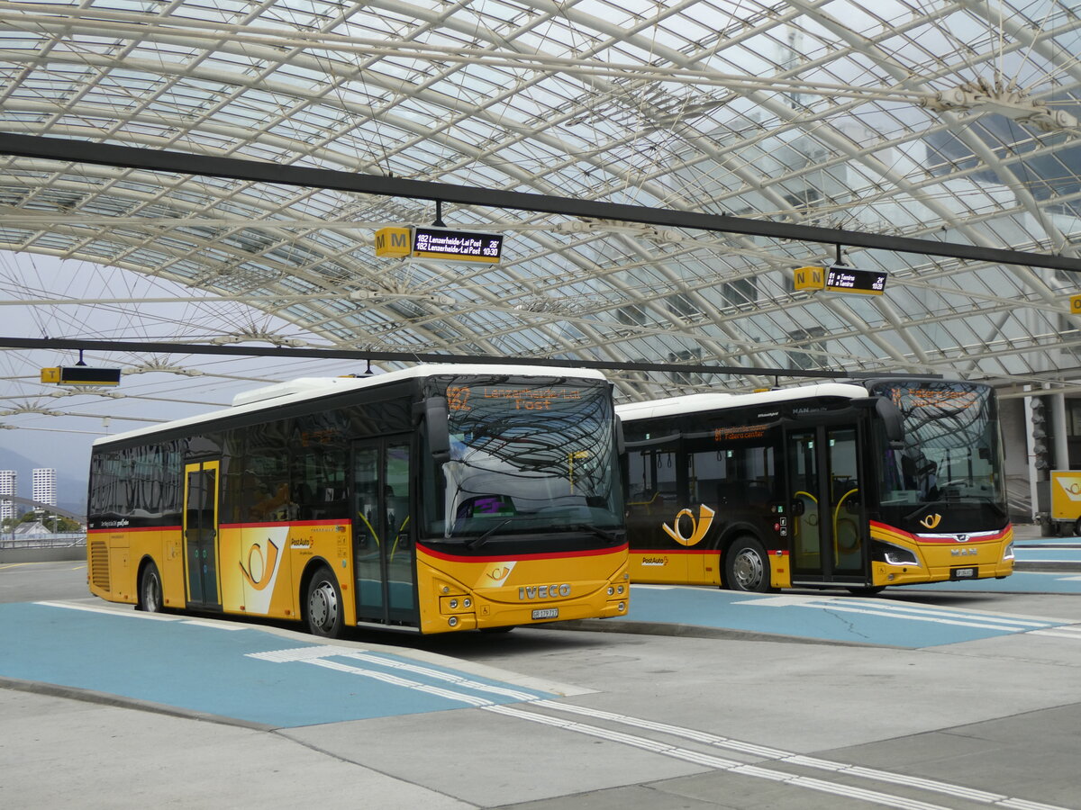 (267'851) - PostAuto Graub�nden - GR 179'717/PID 11'407 - Iveco am 8. Oktober 2024 in Chur, Postautostation