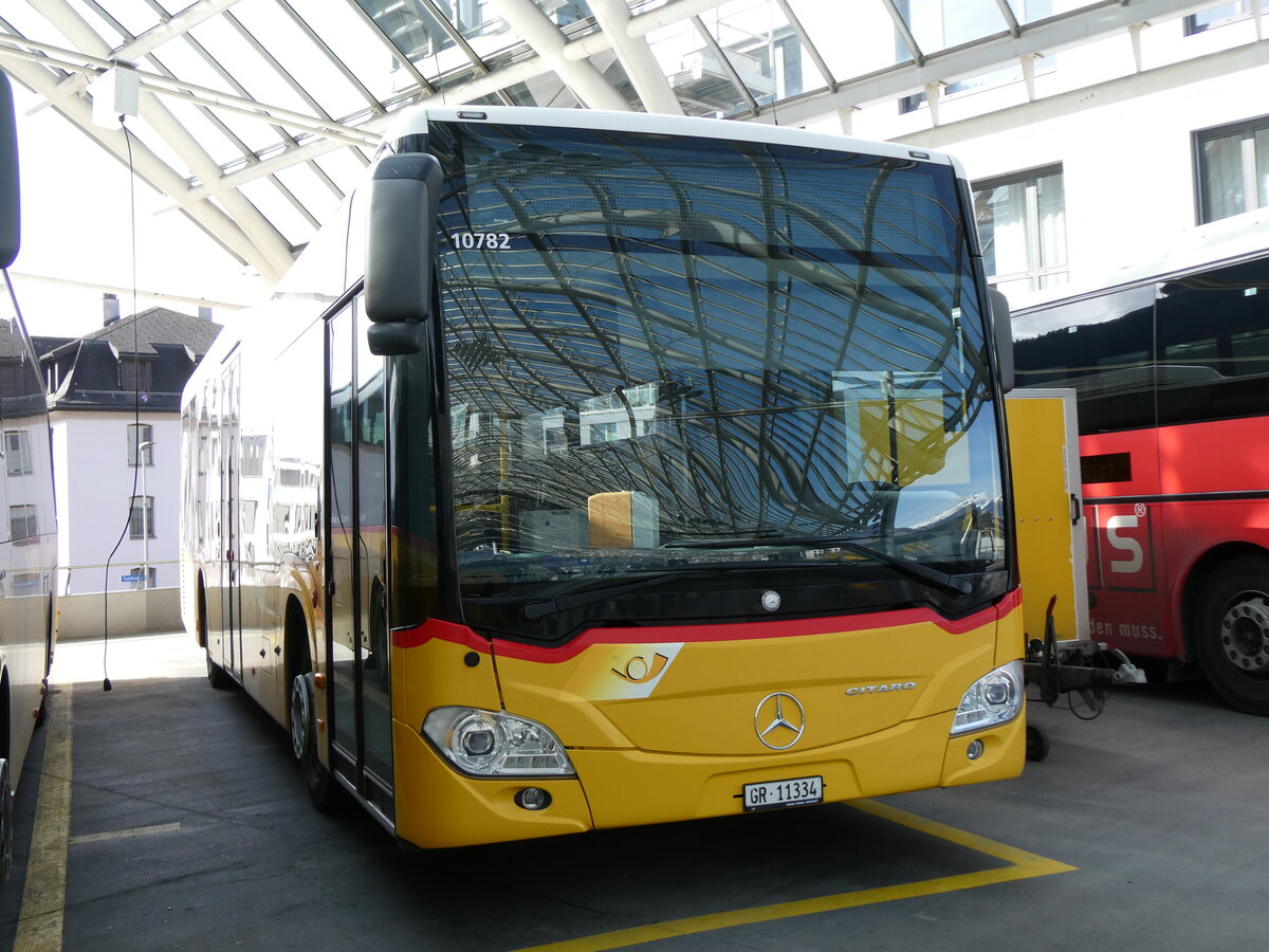 (272'436) - PostAuto Graub�nden - GR 11'334/PID 10'782 - Mercedes (ex PostAuto Ostschweiz) am 22. Februar 2025 in Chur, Postautostation
