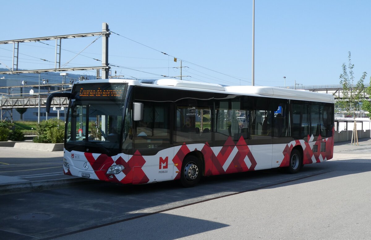 (278'682) - CarPostal Ouest - JU 45'917/PID 10'604 - Mercedes (ex JU 63'349; ex VD 464'947) am 9. August 2025 beim Bahnhof Del�mont