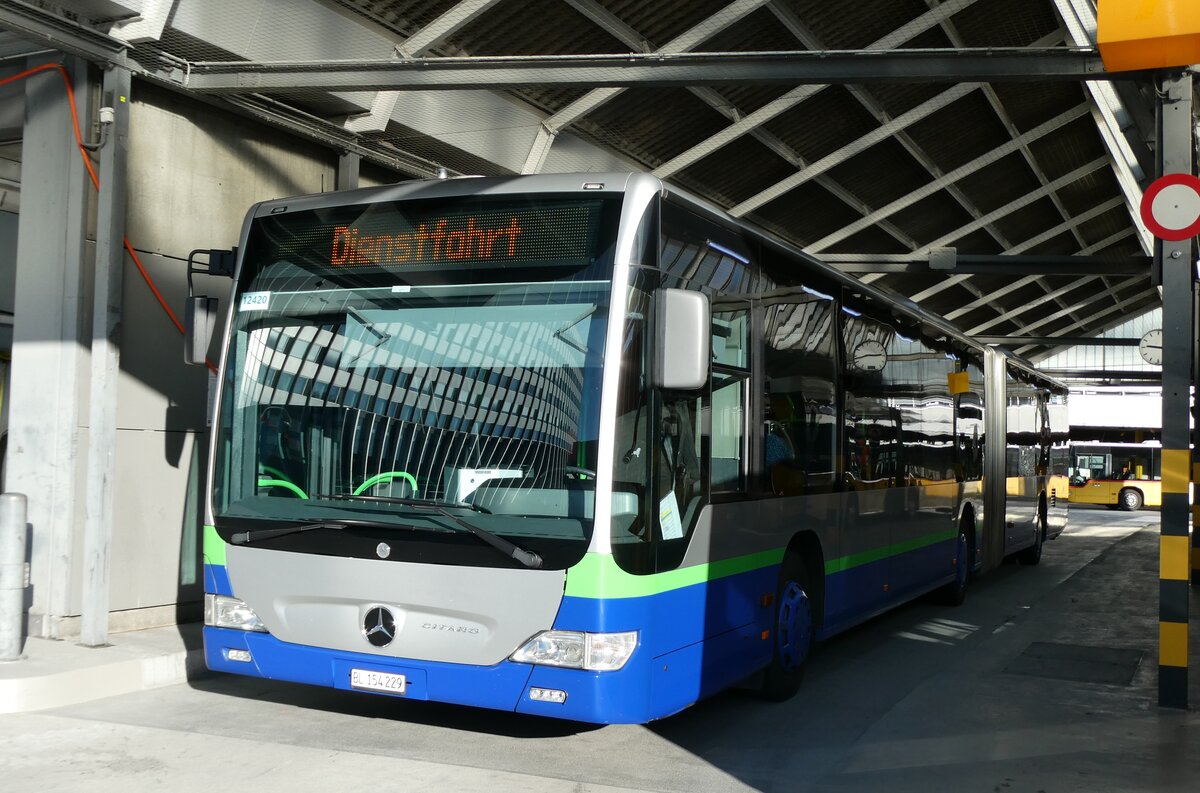 (281'043) - PostAuto Nordschweiz - BL 154'229/PID 12'420 - Mercedes (ex TPL Lugano Nr. 404) am 7. Oktober 2025 in Bern, Postautostation