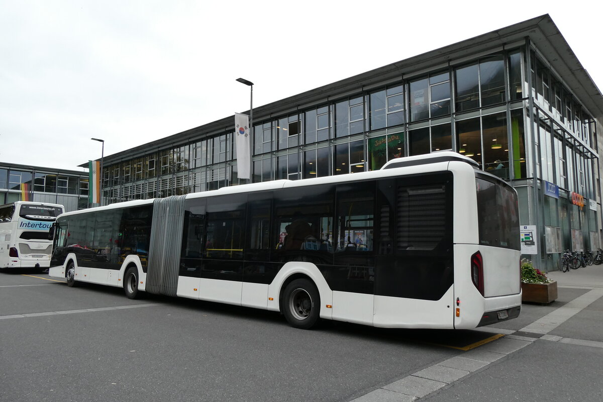 (281'510) - PostAuto Nordschweiz - BL 213'883/PID 12'418 - MAN (ex RSVG Troisdorf/D Nr. 2808) am 14. Oktober 2025 beim Bahnhof Interlaken Ost