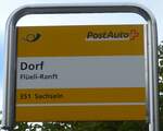 (184'729) - PostAuto-Haltestellenschild - Fl�eli-Ranft, Dorf - am 10.